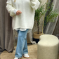 Pull oversize doux avec couture apparente et col montant